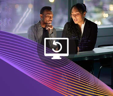 Two young business people working