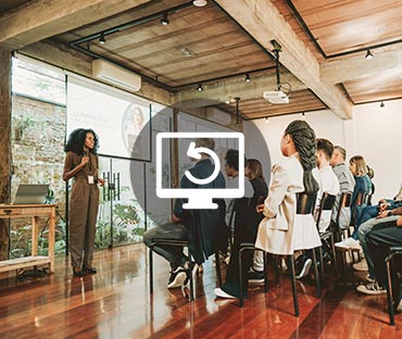 Woman giving speaker presentation