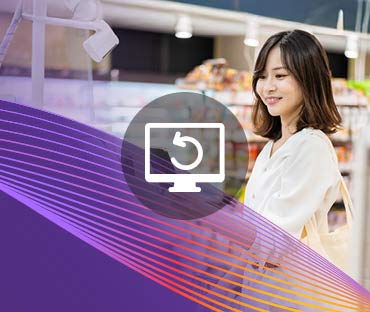 Young woman using self checkout