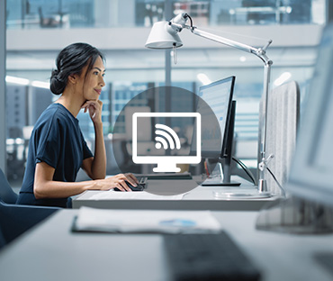 Asian woman working on a desktop