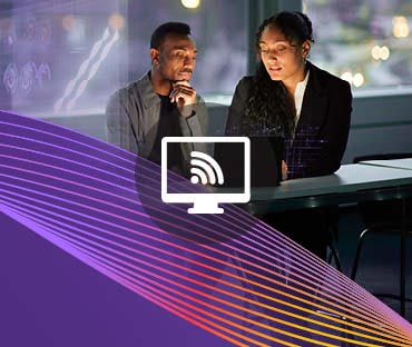 Two young business people working