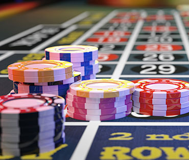Gambling chips placed on roulette