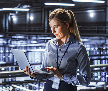 IT specialist using laptop