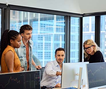 Manager conducting team meeting