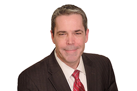 Headshot of Tom Coley