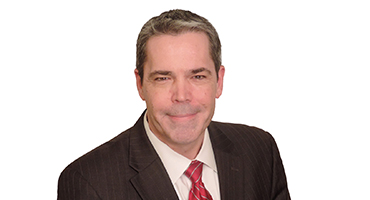 Headshot of Tom Coley