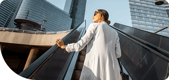 Confident businesswoman and her team