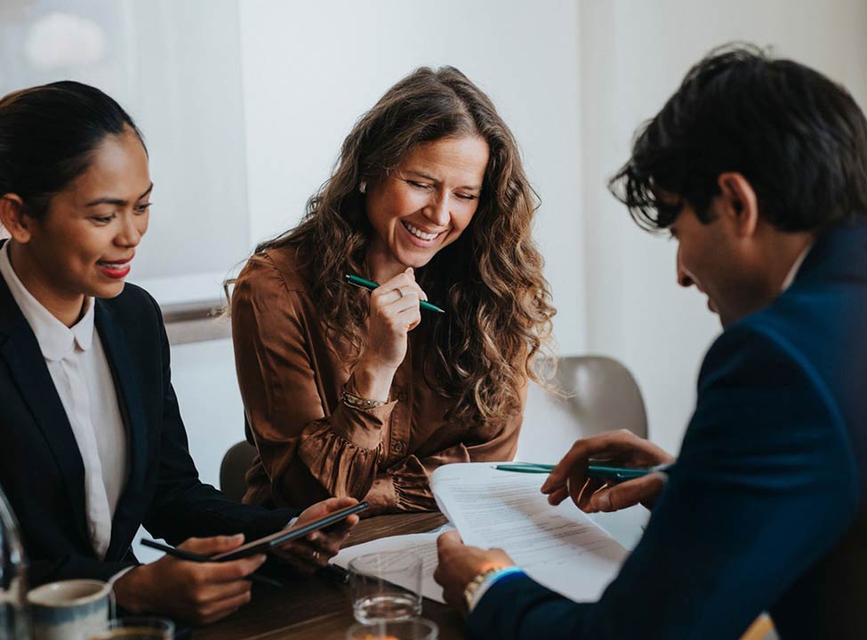 Team happily discussing project