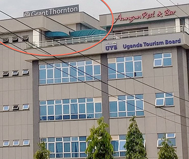 Grant Thornton sign on a Kampala office building
