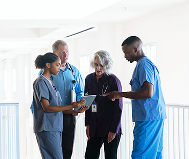 Doctors and nurses discussing
